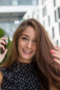 Beautiful young woman with a smartphone Royalty Free Stock Photo