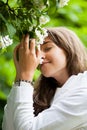 Beautiful young woman smelling Royalty Free Stock Photo