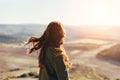 Beautiful young woman smiling on beautiful landscape in sunset time Royalty Free Stock Photo