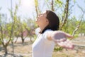 Beautiful young woman smiling cheerful with open arms and eyes closed relaxing and enjoying sunbathe in a sunny day of spring Royalty Free Stock Photo