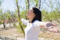 Beautiful young woman smiling cheerful with open arms and eyes closed relaxing and enjoying sunbathe in a sunny day of spring Royalty Free Stock Photo