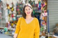 Beautiful young woman smiling cheerful walking by the shops on the street on a sunny days, casual pretty girl shopping at the town Royalty Free Stock Photo