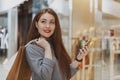 Beautiful woman enjoying shopping spree at the mall Royalty Free Stock Photo