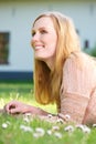 Beautiful young woman smiling and relaxing outdoors Royalty Free Stock Photo