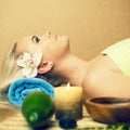 Beautiful young woman at a spa salon. Perfect skin Royalty Free Stock Photo