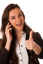Beautiful young woman speaking on a cell phone Royalty Free Stock Photo
