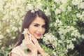 Beautiful Young Woman with Spring Flowers Royalty Free Stock Photo