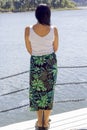 Beautiful young woman standing on the pier Royalty Free Stock Photo