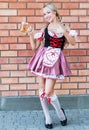 Beautiful woman in Octoberfest dress.