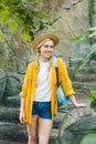 beautiful young woman in straw hat on stone stairs Royalty Free Stock Photo