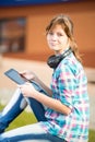 Beautiful young woman student with note pad Royalty Free Stock Photo