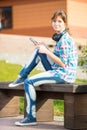 Beautiful young woman student with note pad Royalty Free Stock Photo