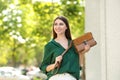 Beautiful young woman with stylish leather bag on summer day Royalty Free Stock Photo