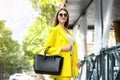 Beautiful young woman with stylish leather bag on summer day Royalty Free Stock Photo