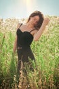 Beautiful young woman in summer field Royalty Free Stock Photo