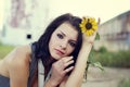 Beautiful young woman with sunflower Royalty Free Stock Photo