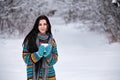 Beautiful young woman in a sweater. Winter outdoors walk with a Royalty Free Stock Photo