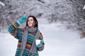 Beautiful young woman in a sweater. Winter outdoors walk with a Royalty Free Stock Photo