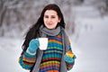 Beautiful young woman in a sweater. Winter outdoors walk with a Royalty Free Stock Photo