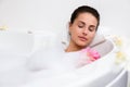 Beautiful young woman takes bubble bath Royalty Free Stock Photo