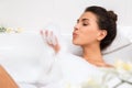 Beautiful young woman takes bubble bath Royalty Free Stock Photo