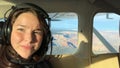 Young female tourist taking a selfie on a flight tour of the Grand Canyon Royalty Free Stock Photo