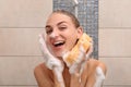 Beautiful young woman taking shower Royalty Free Stock Photo