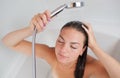 Beautiful young woman taking a shower Royalty Free Stock Photo