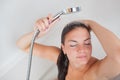 Beautiful young woman taking a shower Royalty Free Stock Photo