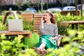 Beautiful young woman talking on mobile phone outdoors Royalty Free Stock Photo