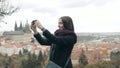 Beautiful Young Woman Tourist In Prague, Making Selfie or Taking Photo With Her Mobile Phone, Travelling Concept Royalty Free Stock Photo