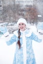 Beautiful young woman in traditional russian suit of snow maiden, new year and christmas holiday girl Royalty Free Stock Photo