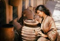 Beautiful young woman in a traditionally Moroccan caftan.