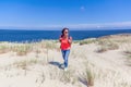 Beautiful young woman traveler with a backpack Royalty Free Stock Photo