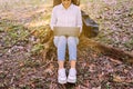 Beautiful young woman using laptop computer at park in the morning,Happy and smiling,Close up Royalty Free Stock Photo