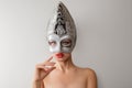 Beautiful young woman in venetian carnival mask Royalty Free Stock Photo