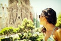 Beautiful young woman visits Barcelona