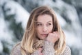 Beautiful young woman on a walk in winter nature Royalty Free Stock Photo