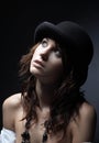 Beautiful young woman wearing black hat Royalty Free Stock Photo