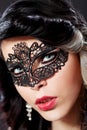 Beautiful young woman wearing a face masque