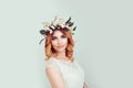 Beautiful young woman wearing floral headband Royalty Free Stock Photo