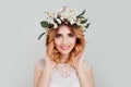 Beautiful young woman wearing floral headband toothy smile Royalty Free Stock Photo