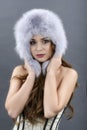 Beautiful Young Woman wearing Fur Hat. Royalty Free Stock Photo