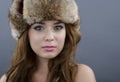 Beautiful Young Woman wearing Fur Hat. Royalty Free Stock Photo