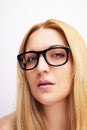 Beautiful young woman wearing glasses. Close-up shot. Royalty Free Stock Photo