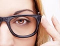 Beautiful young woman wearing glasses. Close-up shot. Royalty Free Stock Photo