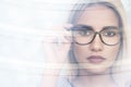 Beautiful young woman wearing glasses. Close-up shot Royalty Free Stock Photo