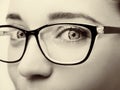 Beautiful young woman wearing glasses close-up on white background. Royalty Free Stock Photo