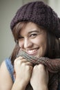 Beautiful Young Woman in Knit Scarf and Hat Royalty Free Stock Photo