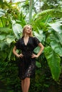 Beautiful young woman wearing summer clothes on tropical resort